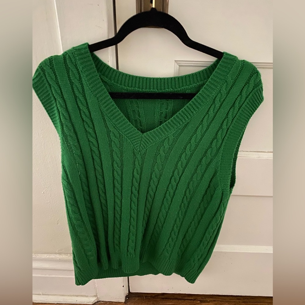 Green vest gently worn